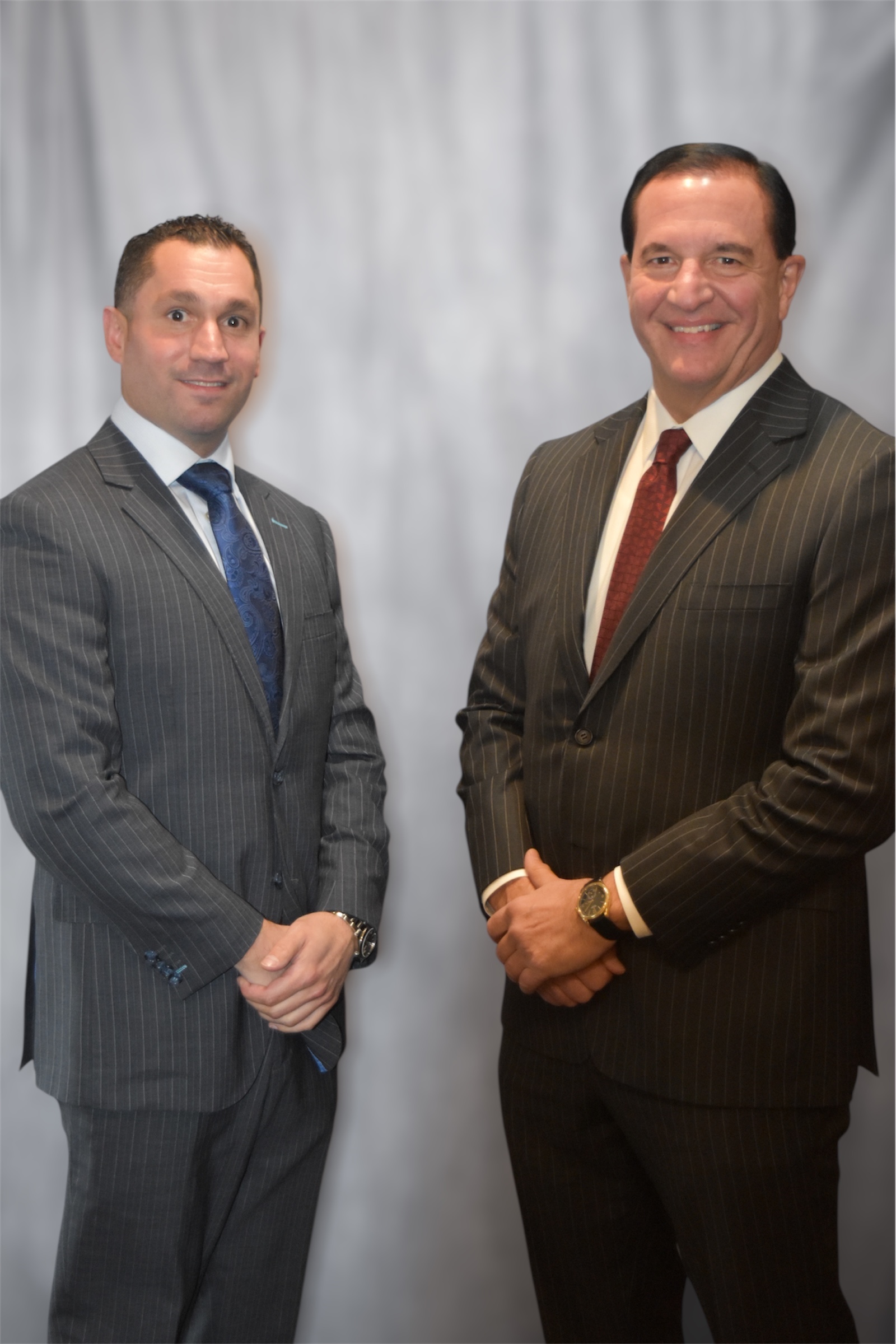 Attorneys Domenic and Joseph collaborating on case strategy